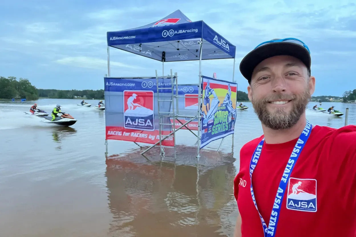 Custom pop-up tent and event booth for the American Jet Ski Association at a waterfront race event